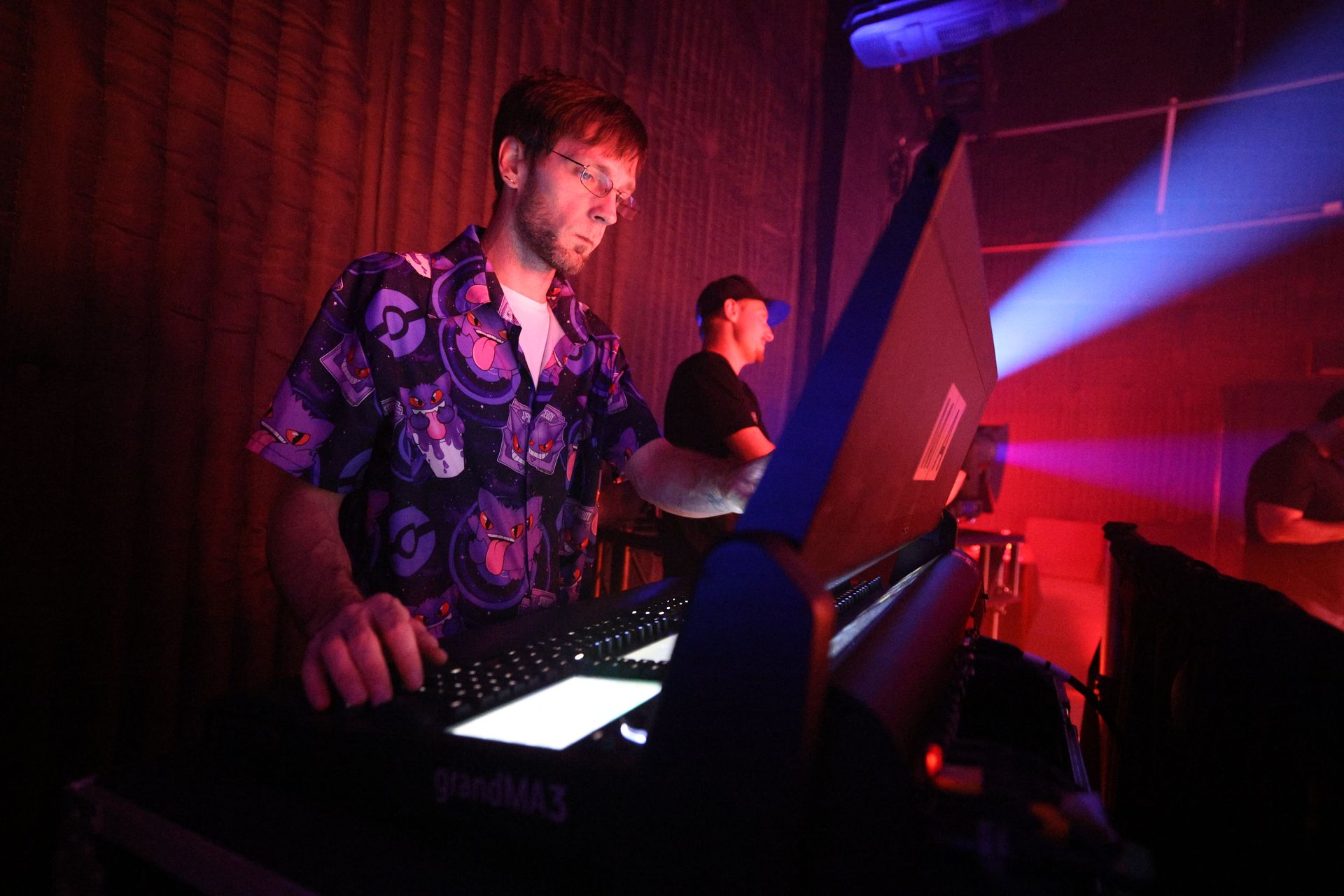 Logan Pentecost behind the console at a live show