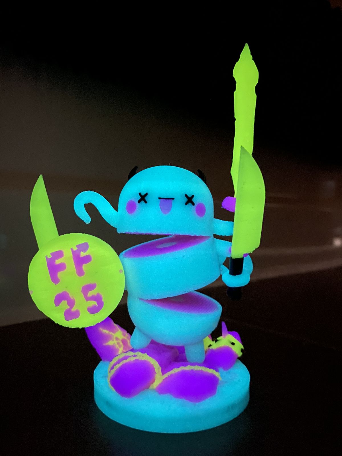 Glow-in-the-dark printed mini under blacklight